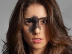 Influencer com pinta no rosto questiona padrões de beleza na internet